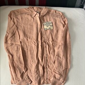 Womens button down shirt  size 36 european size approximately US size 6 NWT.